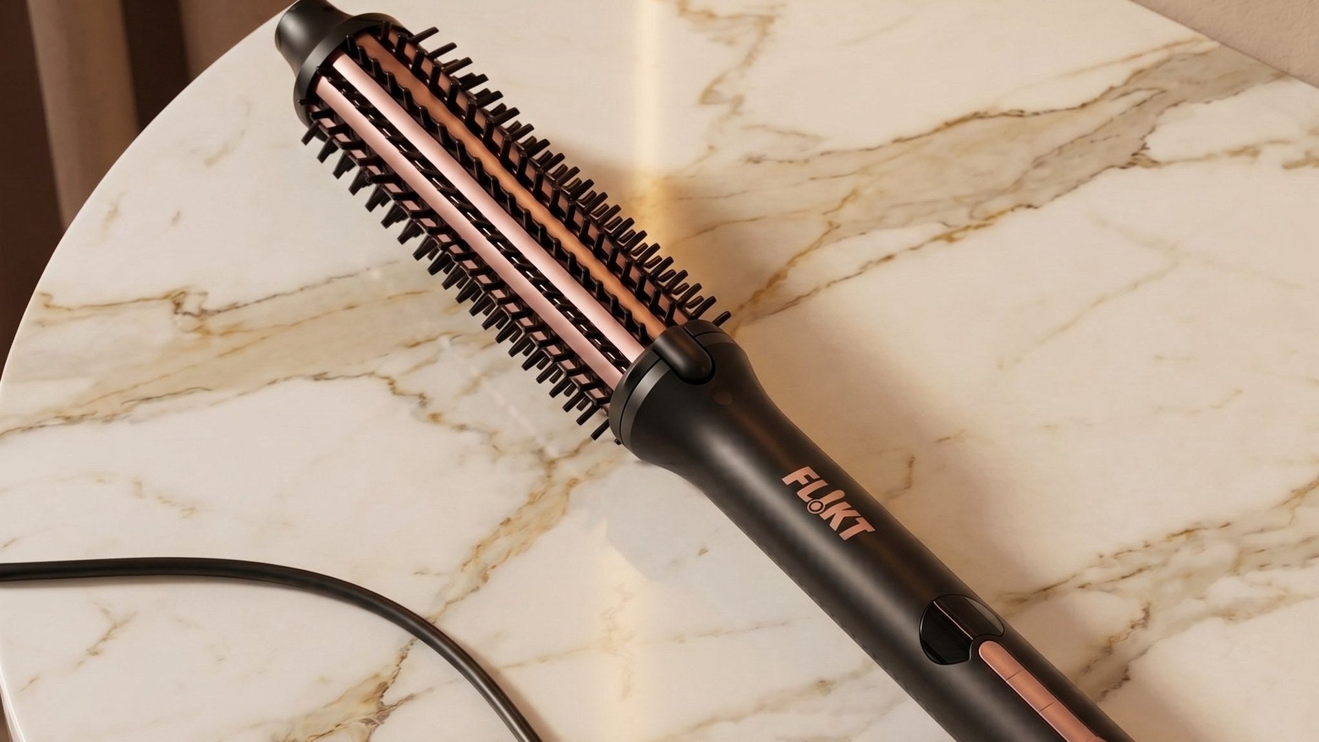 FL!KT thermal hot brush being used to add volume and curl at the ends of medium-length hair